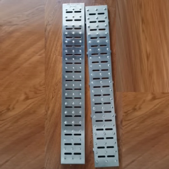 Slotted stamped drainage channel cover